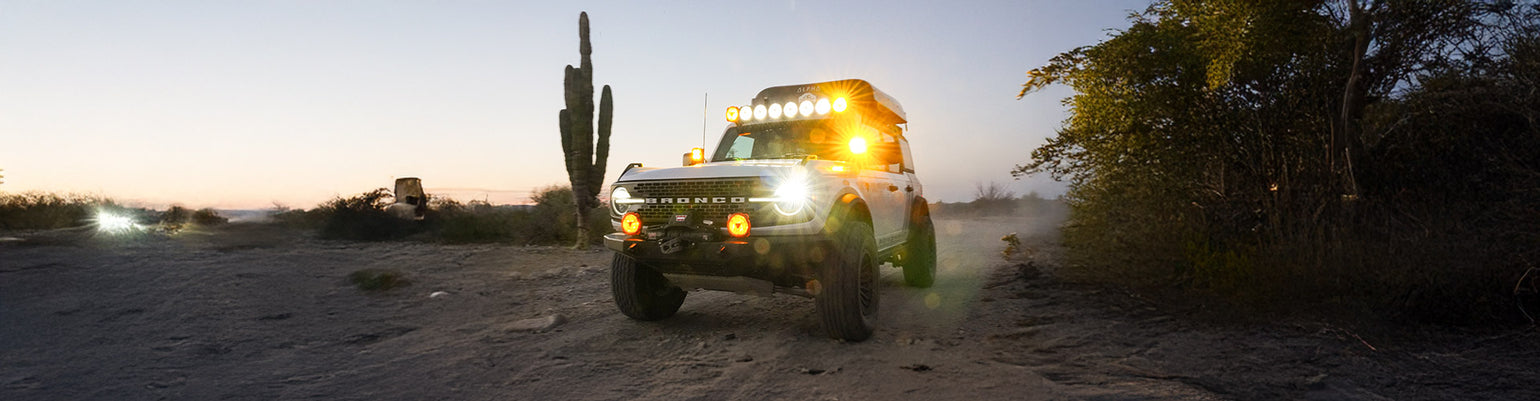 Rugged Radios Ford two‑way radio communication kits and A‑pillar or center‑console antenna and radio mounts for F‑150 Raptor, Bronco, Ranger, Transit, and other trims