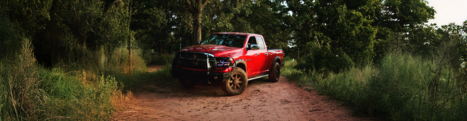 Rugged Radios Ram truck two‑way radio kits and A‑pillar antenna mount with center‑console radio bracket for seamless install in Ram TRX and 1500 Rebel off‑road vehicles.