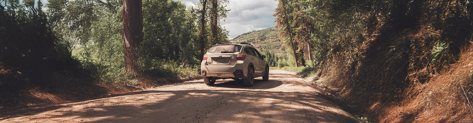 Rugged Radios Subaru Crosstrek two‑way GMRS mobile radio or handheld kit with direct‑fit radio mount on passenger console, bolt‑on A‑pillar antenna mount, and no‑drill installation for Crosstrek and Wilderness vehicles.